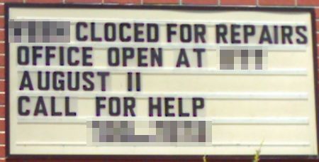 School marquee: Cloced for repairs (Call for help)