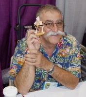 Sergio Aragonés with a Groo statue