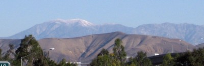 Distant mountains with one peak lightly dusted in snow