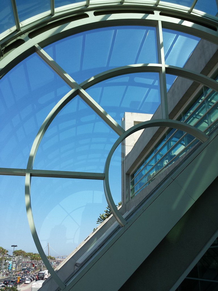 Circular window with concentric circles and spokes, seen from below and to one side.