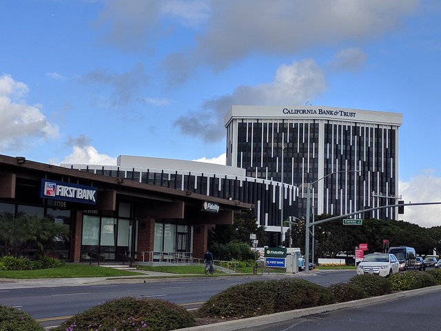 Buildings with vertical lines between the windows, but instead of painting all the way up, they're staggered like static.