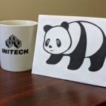 Panda with an INITECH coffee mug.